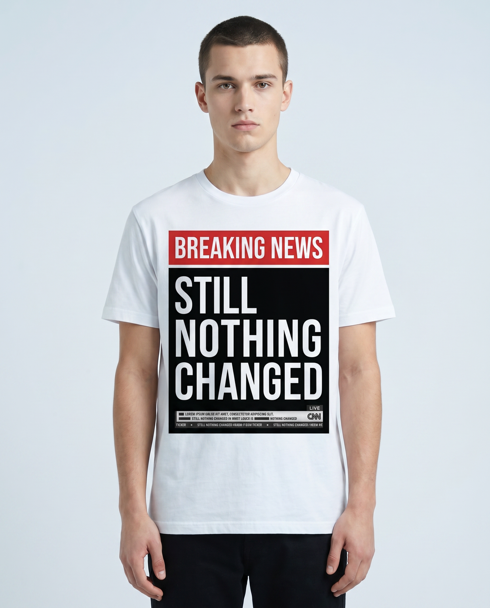 Breaking News Still Nothing Changed news-parody tee worn by model