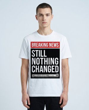 Breaking News Still Nothing Changed news-parody tee worn by model